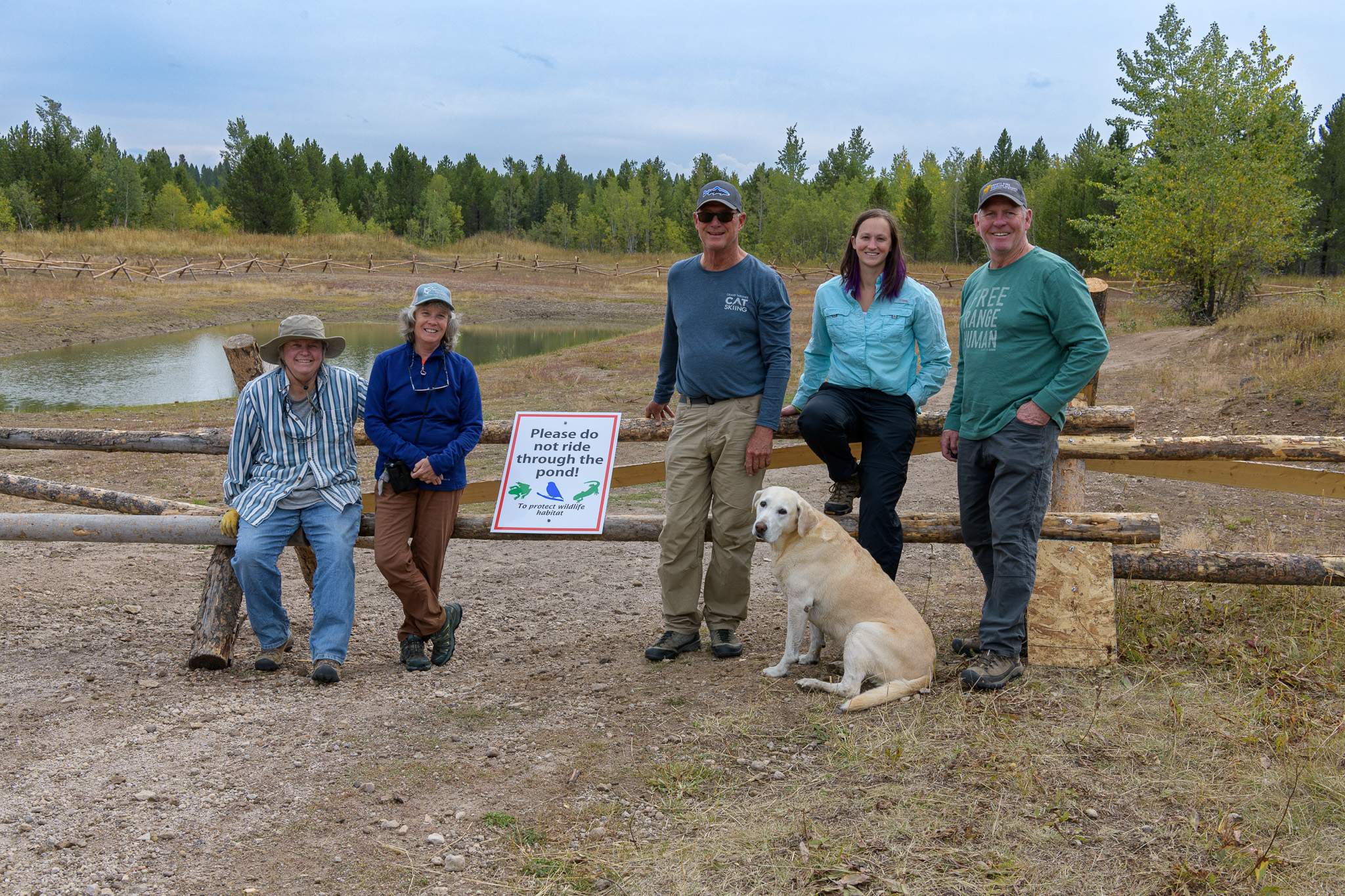 Group of volunteers by pond